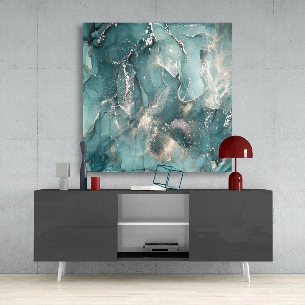 Teal and silver glass wall art with fluid marbled patterns