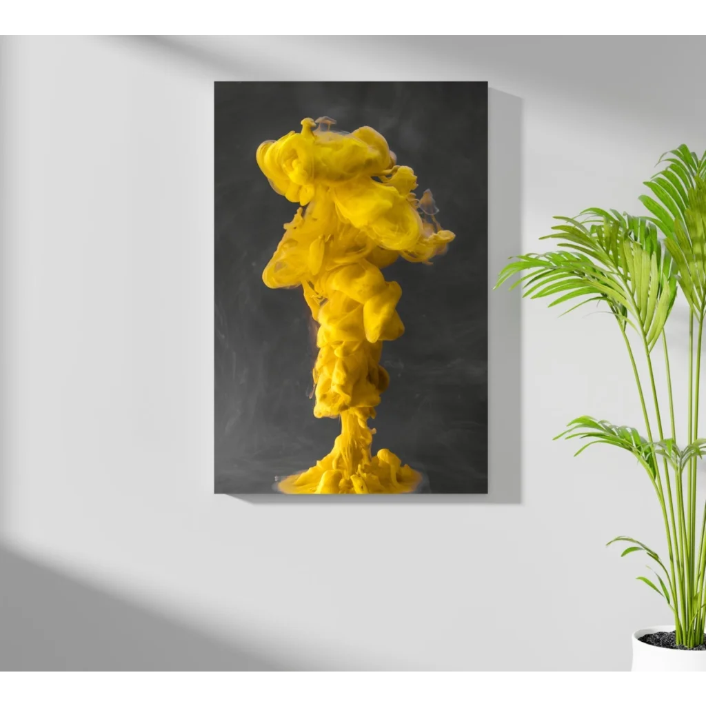 Vibrant yellow ink explosion on Insigne aluminum print against dark gray backdrop