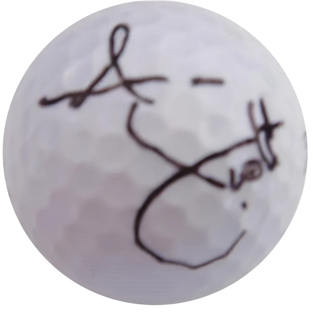 Adam Scott autographed golf ball with black signature on white ball