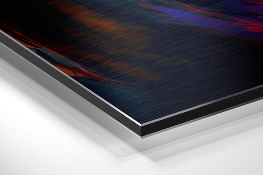 Close-up angled view of layered aluminum dibond panel showing brushed metal edge and white backing layers.