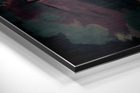 Close-up angled view of layered aluminum dibond panel edges showing brushed metal finish and white backing material.