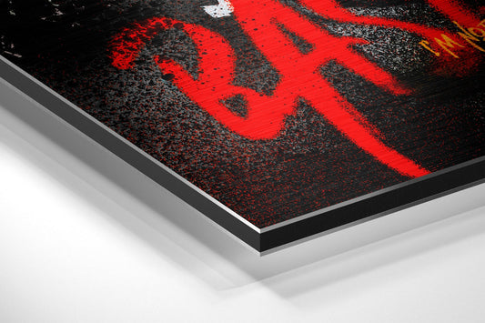 Angled close-up of layered aluminum dibond wall art showing red crown design on textured black surface with silver edge detail.