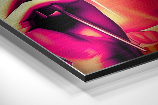 Angled view of brushed aluminum Dibond wall art displaying vibrant magenta, purple, and orange abstract swirls with a black border and white shadow effect.