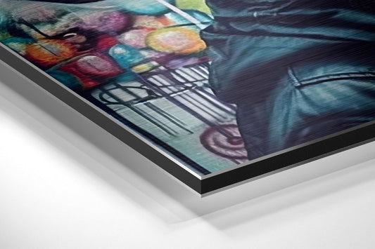 Close-up angled view of brushed aluminum dibond layered edge showing colorful graffiti woman portrait with rainbow beanie.