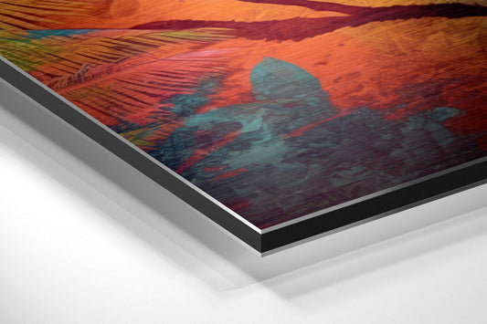 Close-up angled view of brushed aluminum dibond wall art showing layered edge construction with vibrant tropical tiger and palm design in orange, red, teal, and green tones.