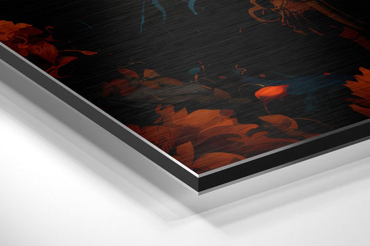 Angled close-up view of brushed aluminum dibond wall art displaying red and orange blossoms on dark textured background with visible layered edges.