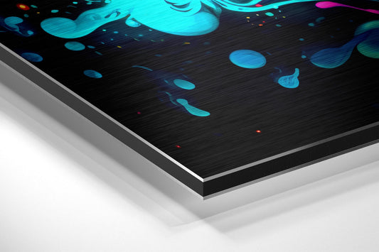 Angled perspective view of brushed aluminum Dibond wall art with cyan and magenta liquid bubble design on dark textured background.