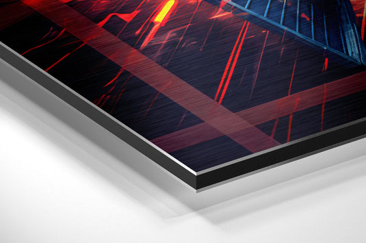 Angled perspective view of brushed aluminum dibond wall art with red and blue neon light burst design and layered edge detail.