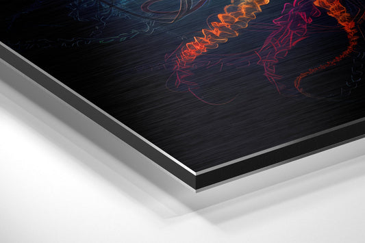 Angled view of layered aluminum dibond panel displaying neon jellyfish outline in orange and magenta against dark brushed surface.