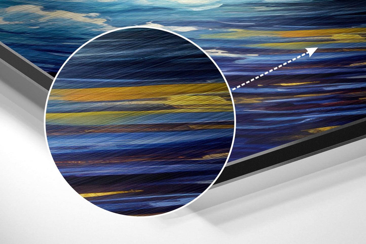 Angled close-up of brushed aluminum wall art showing horizontal striped ocean waves in blue, yellow, and brown tones with magnified circular detail view.