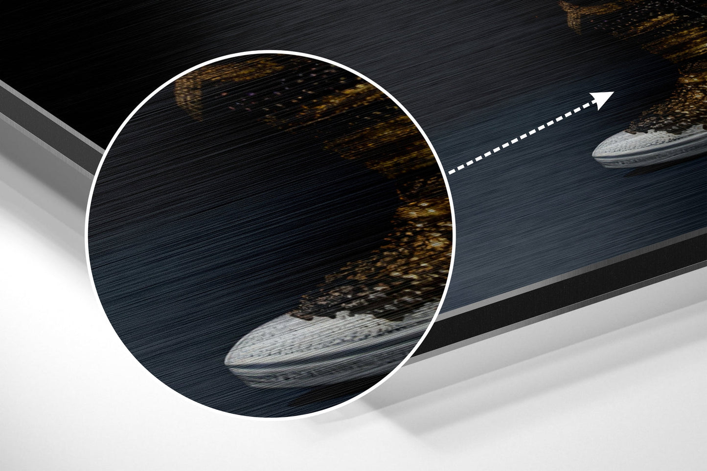 Close-up detail of brushed aluminum Dibond wall art showing textured dark surface with gold and bronze tonal variations and metallic finish.