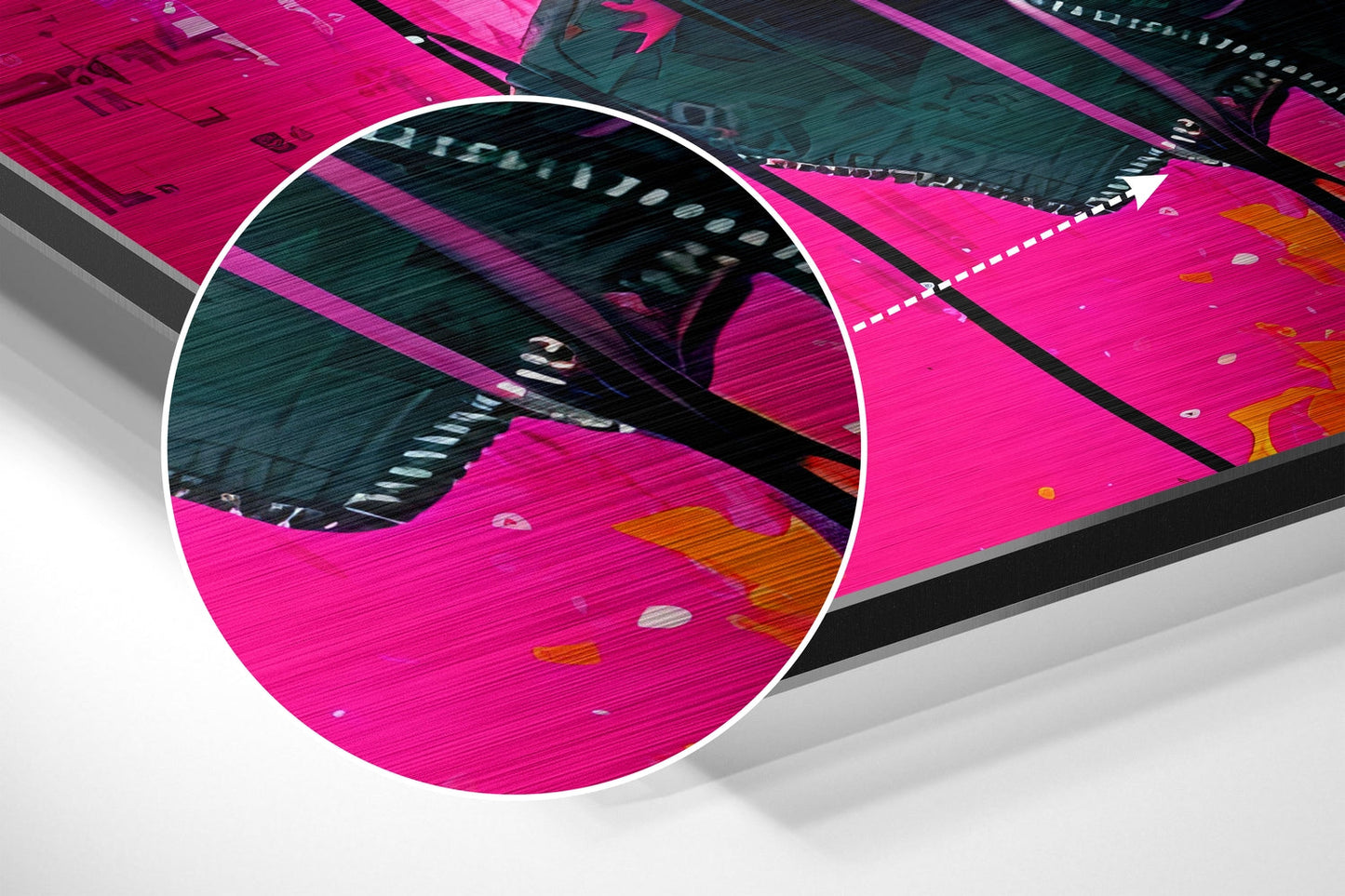 Angled close-up of brushed aluminum wall art showing vibrant magenta and teal colors with circular magnification detail highlighting printed design elements.
