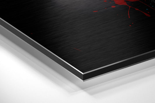Close-up angled view of layered brushed aluminum Dibond panel with black textured top surface and white base layers visible.