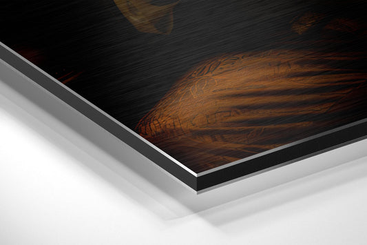 Close-up angled view of layered materials showing dark wood grain surface with white and gray aluminum backing layers.
