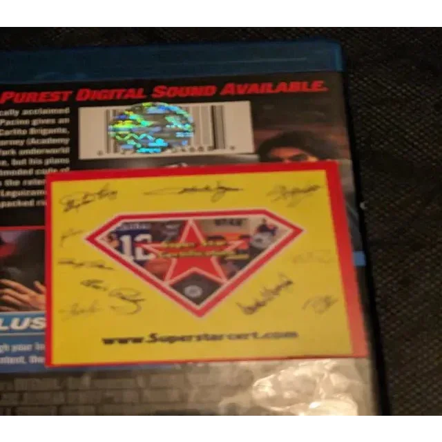 Blu-ray disc case with holographic sticker and yellow card from Al Pacino Carlitos Way autographed DVD