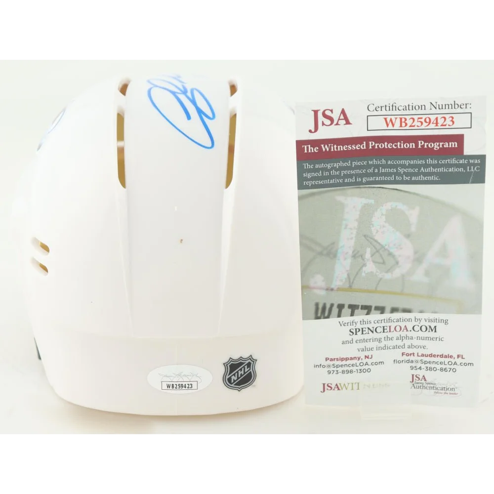 White Avalanche mini helmet signed by Andrew Cogliano with NHL logo and blue autograph