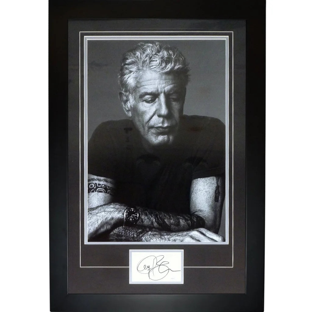 Grayscale signed Anthony Bourdain portrait in black frame with JSA autograph plaque