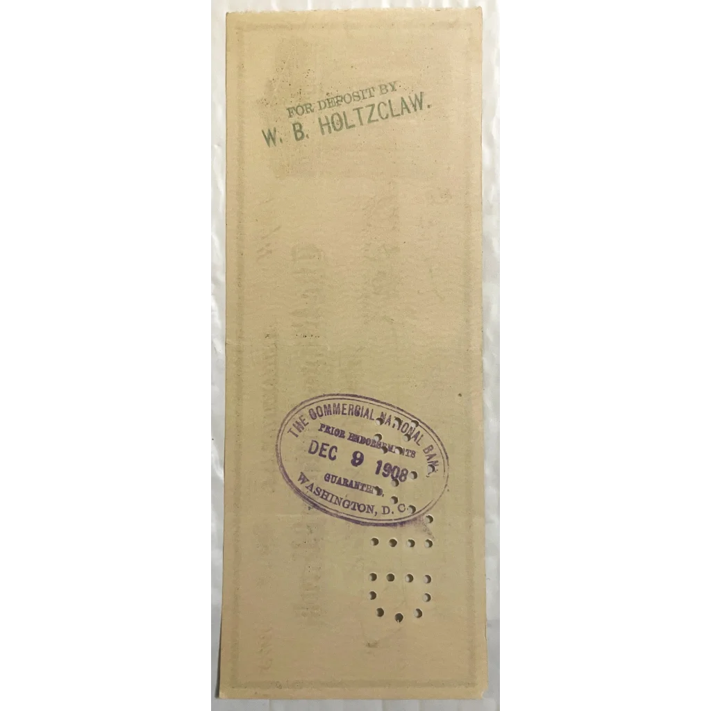 Vintage Riggs National Bank check from the early 1900s with a faded official stamp