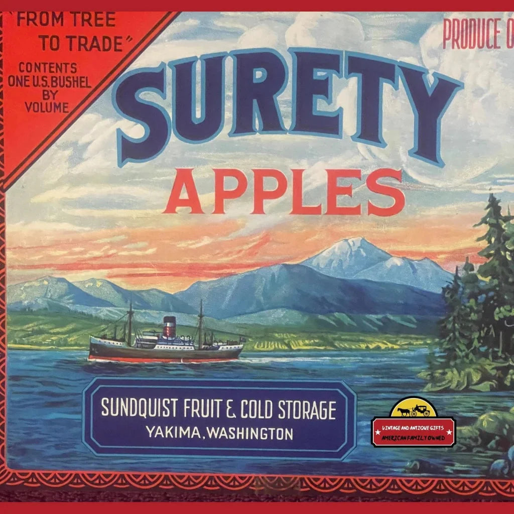 Vintage Surety Crate Label showcasing apples with a scenic mountain and steamship view