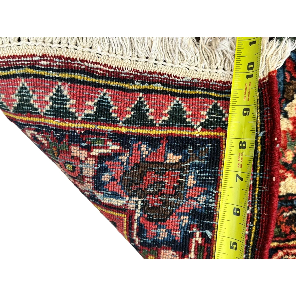 Vibrant antique Persian Bakhtiari rug with floral details in red and blue