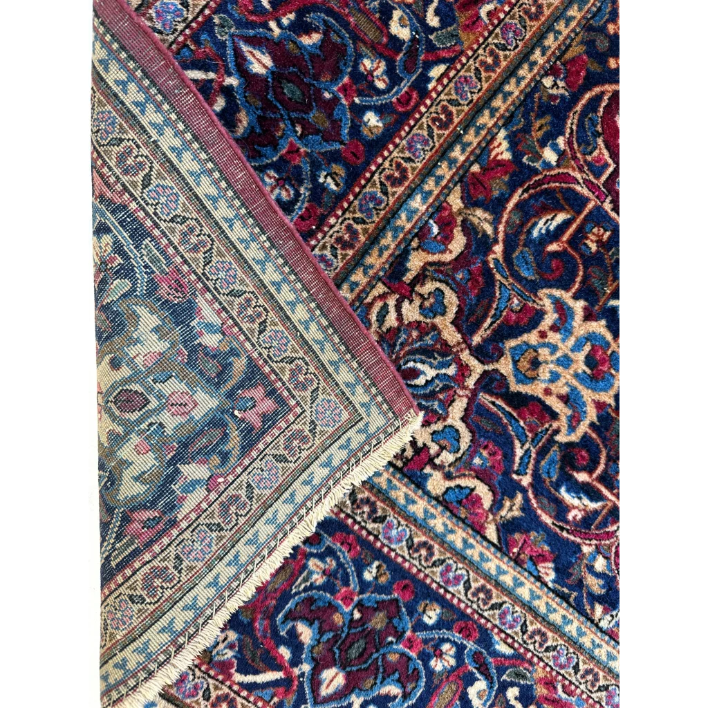 Antique Persian Kashan Debir rug with intricate floral patterns in blues and burgundy, 4’3’’ x 6’4’’, circa 1920s