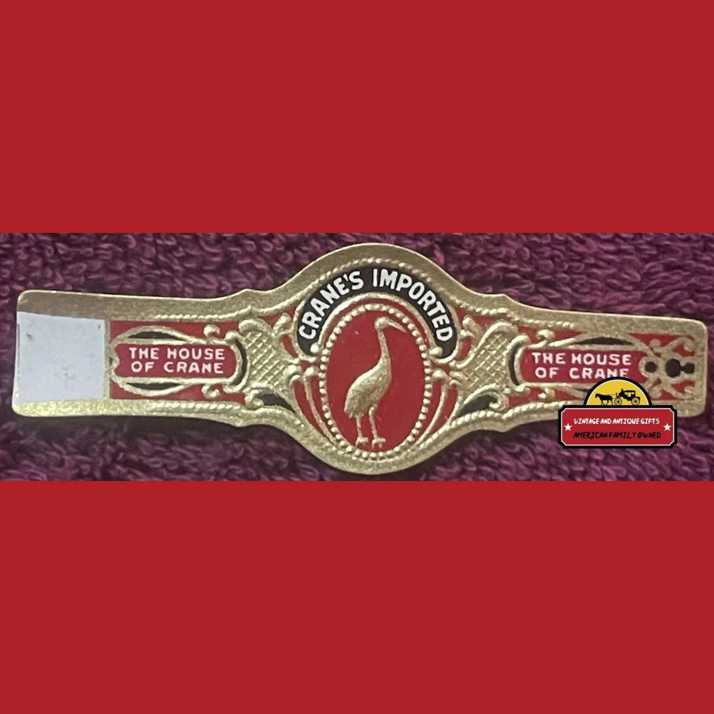 Antique vintage embossed cigar band featuring a crane logo and Cranes Imported text
