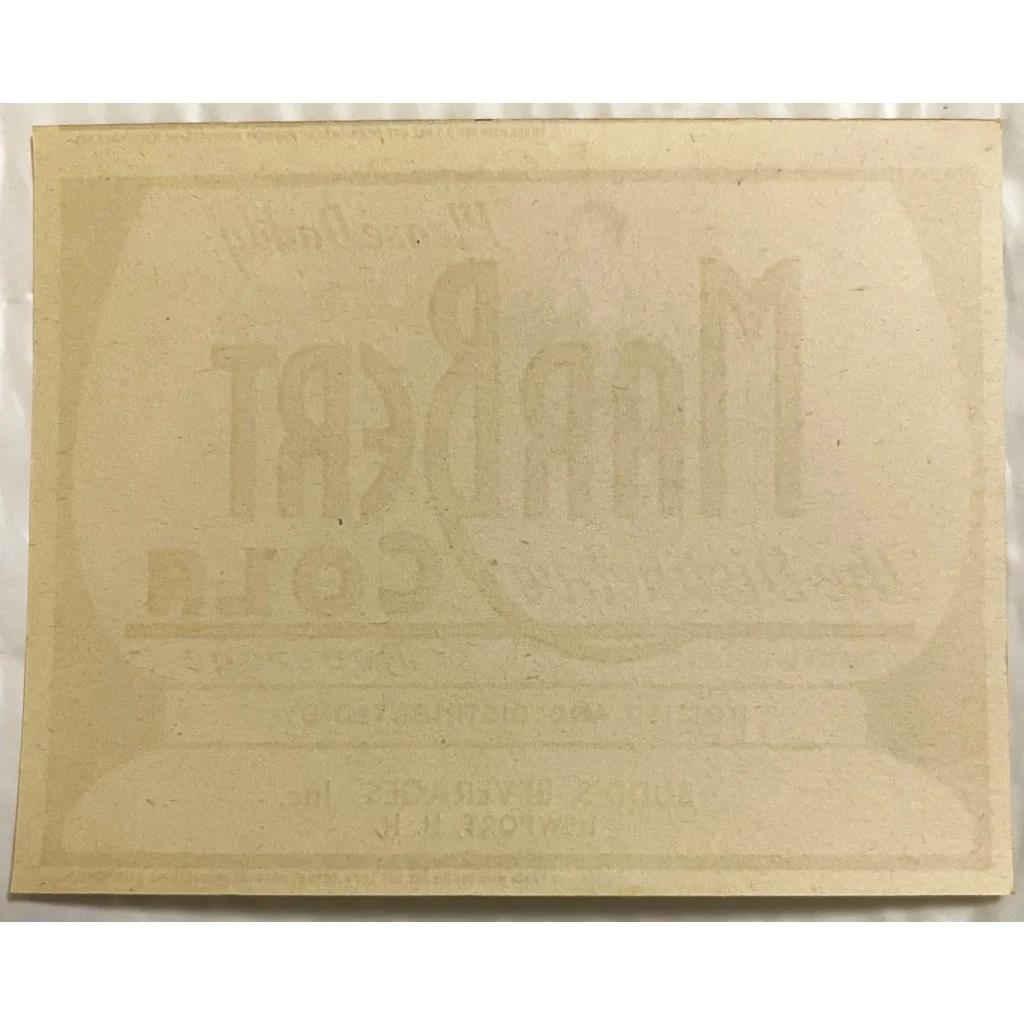 Faded Marbert Cola label on a light surface, showcasing antique vintage 1930s charm