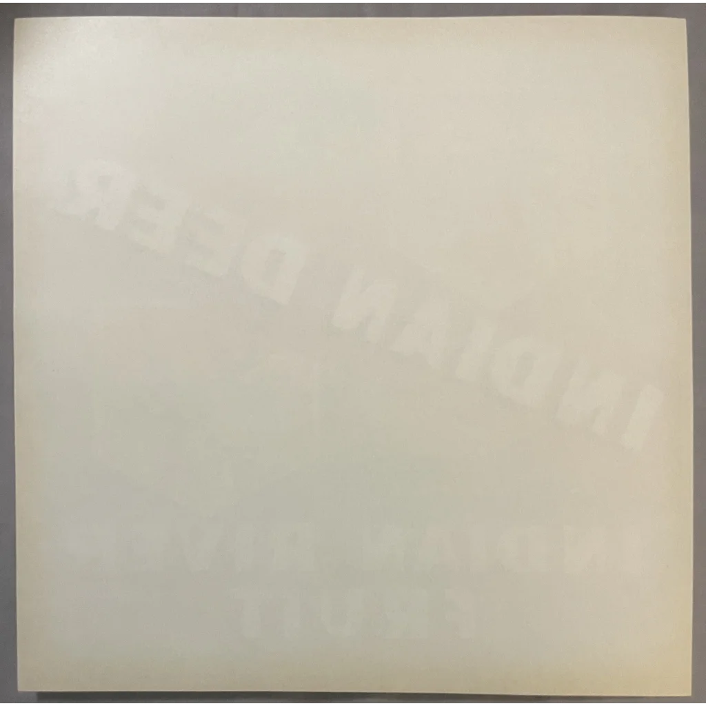 Pale off-white canvas with tonal variations on a Rare Indian Deer Crate Label