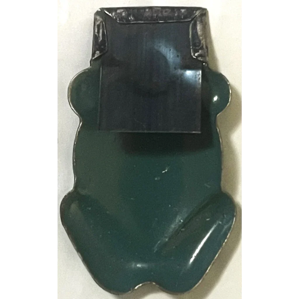 Dark green frog-shaped solar-powered calculator with Nostalgic 1950s tin clicker design