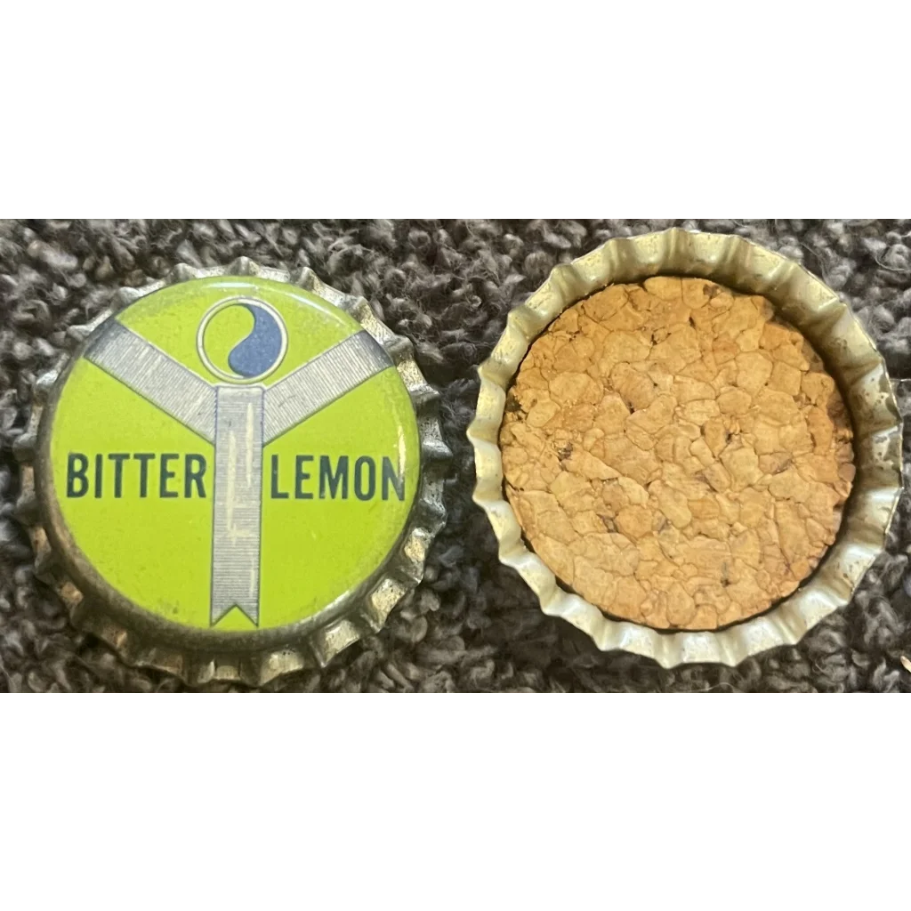 Vintage 1960s Pequot bottle cap next to a cork from a Bitter Lemon drink