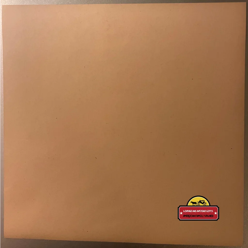 Plain brown cardboard box with a Dixie Boy crate label showcasing 1930s Florida charm