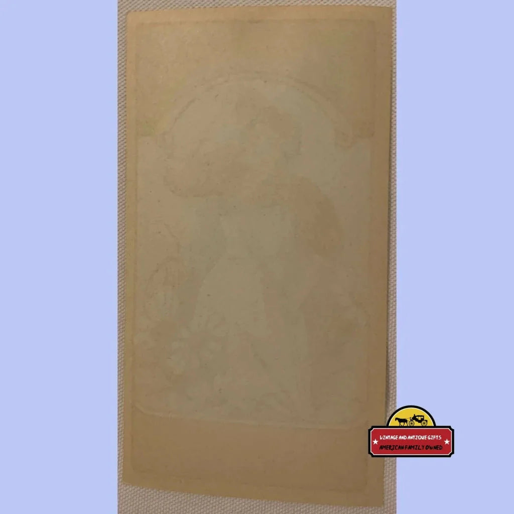 Brown paper bag with Enchanting Antique Vintage Broom Label for unique antique gifts