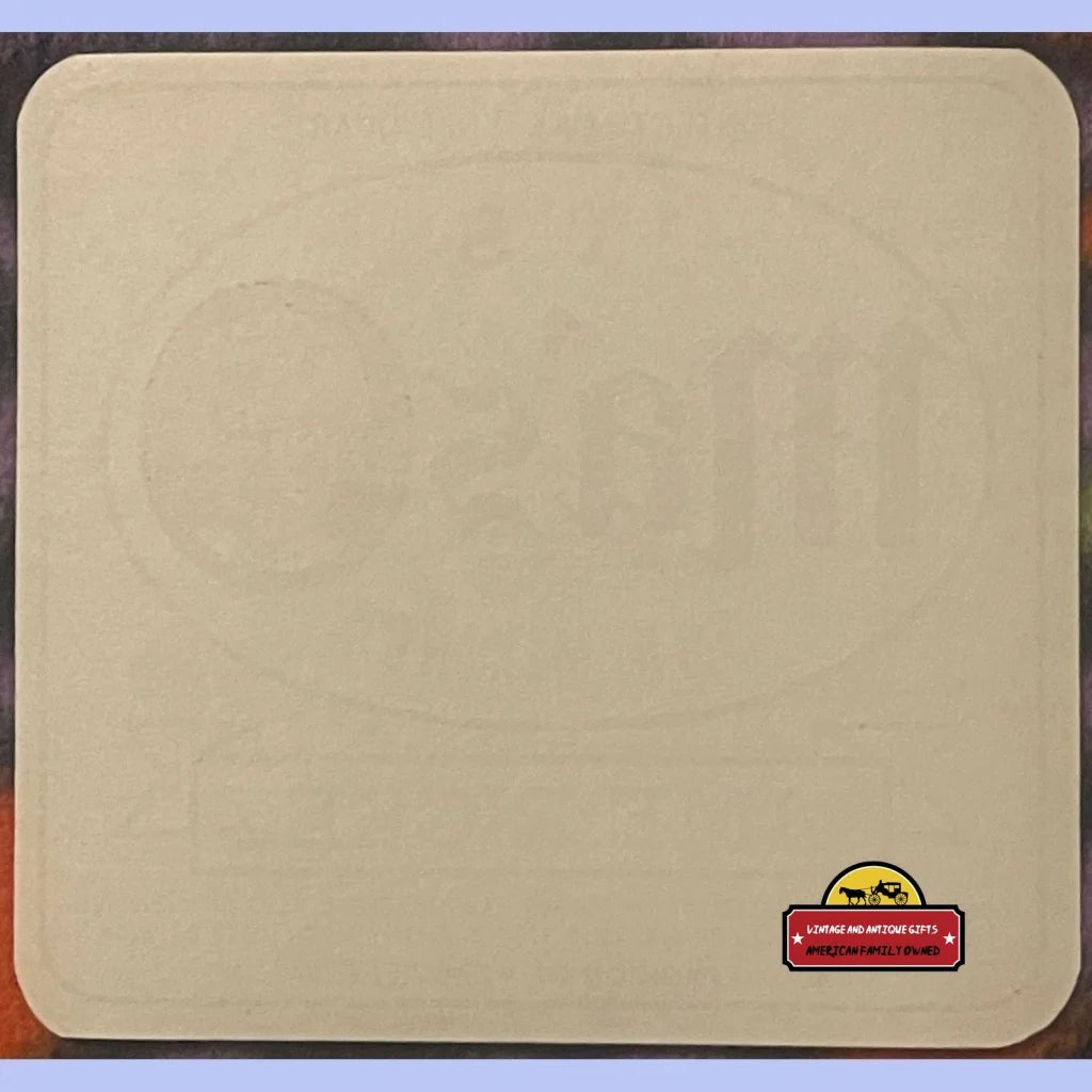 Beige square mousepad featuring a logo, perfect for any Antique Vintage Lime Rickey fan