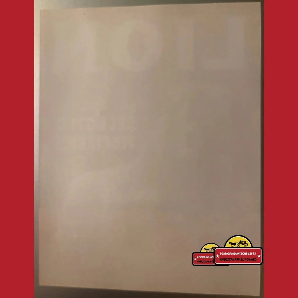 Blank canvas with a cartoon sticker beside Roaring Antique Vintage Lion Crate Label