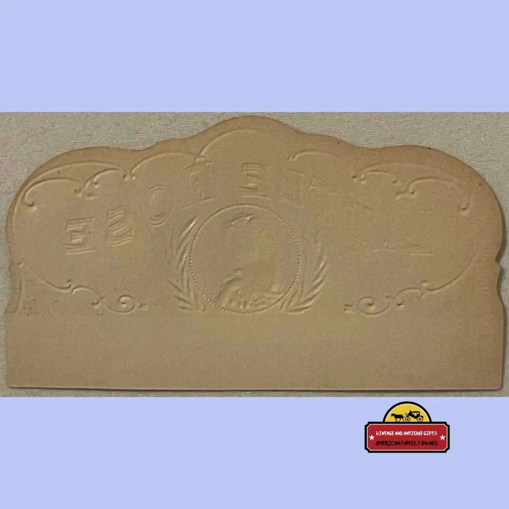 Ornate beige headboard with carvings and medallion, perfect for a vintage cigar box vibe