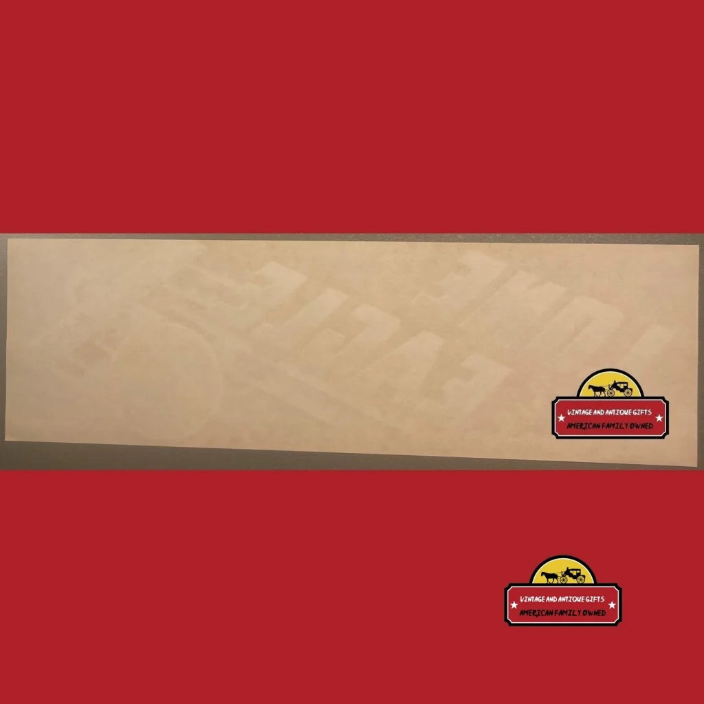 Beige bulletin board on a red wall showcasing Rare Antique Vintage Lone Eagle Crate Label