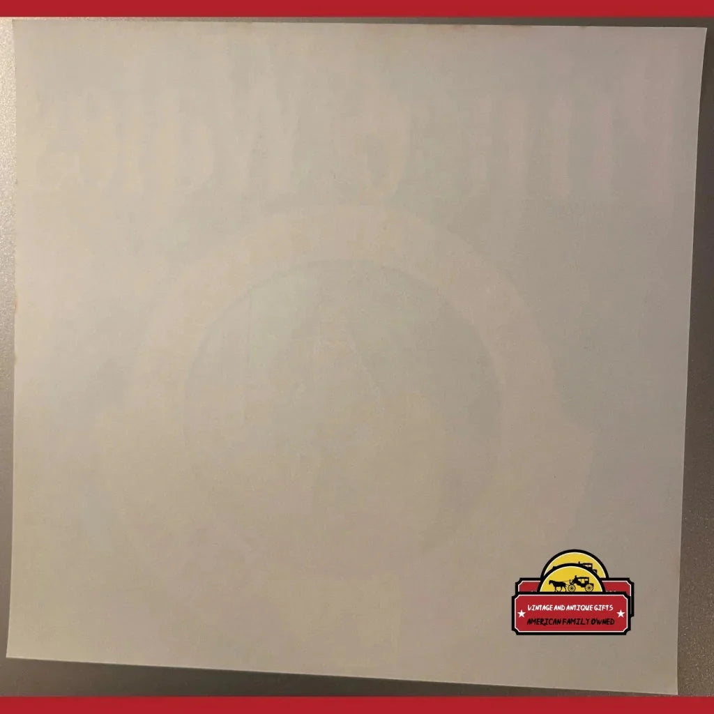 Blank white canvas with a cute sticker, showcasing a Rare Antique Vintage Wales Crate Label