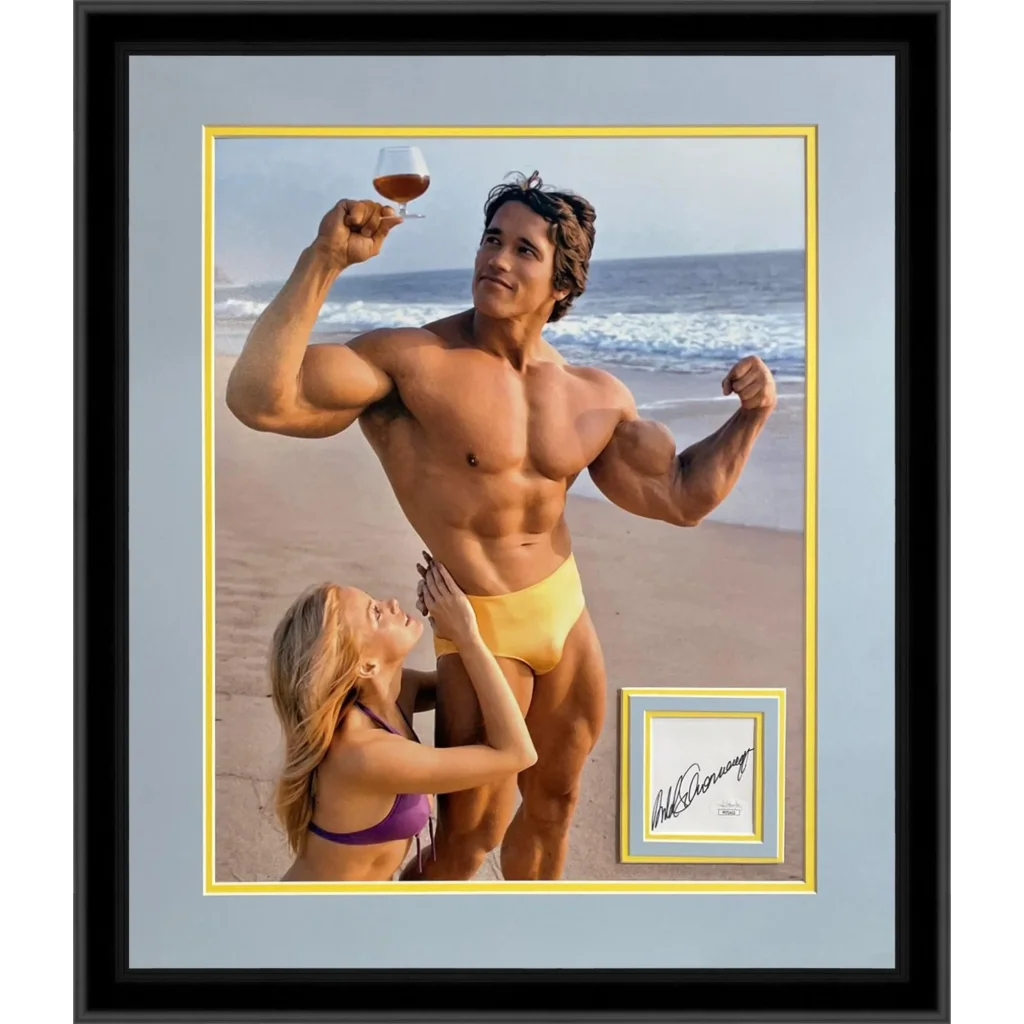 Arnold Schwarzenegger deluxe framed 16x20 photo of him in yellow trunks with wine on beach, autographed