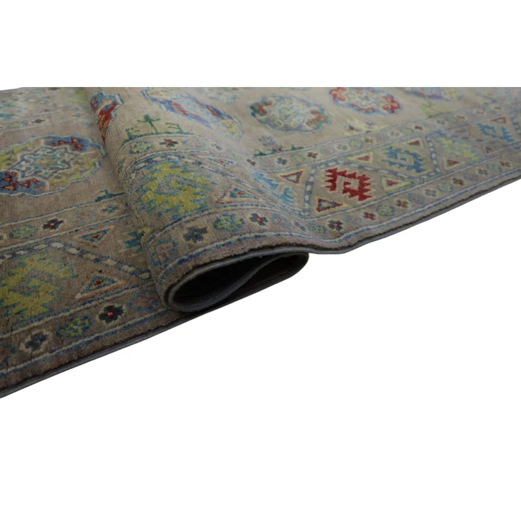 Vintage Afghan Kazak wool runner with cotton foundation and faded floral patterns