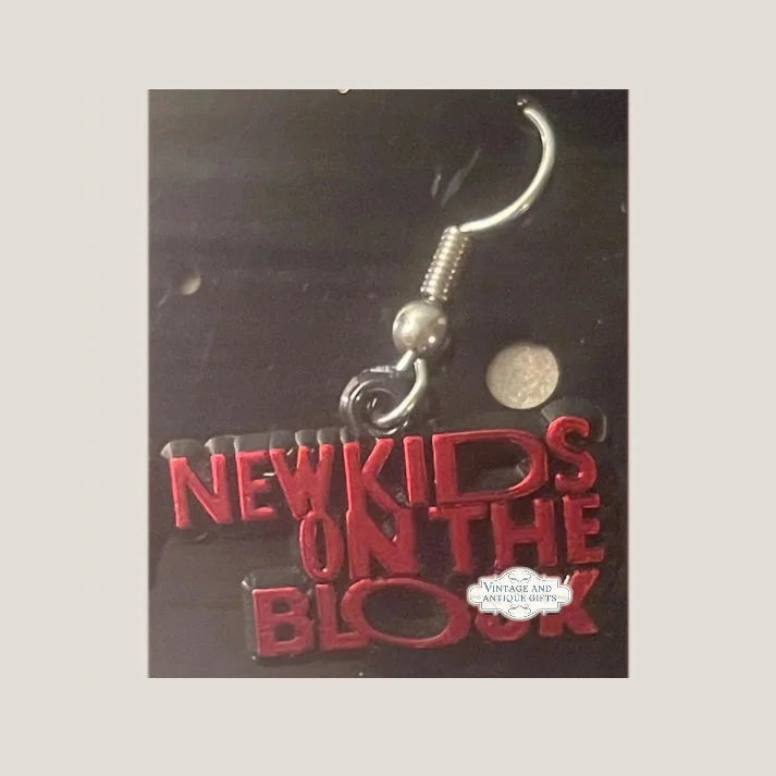 Red New Kids on the Block earrings with silver hook, perfect for a retro vibe
