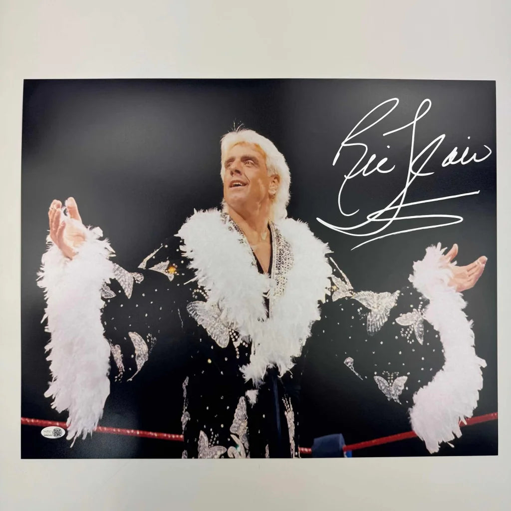 Authentic signed white feathered wrestling outfit with COA