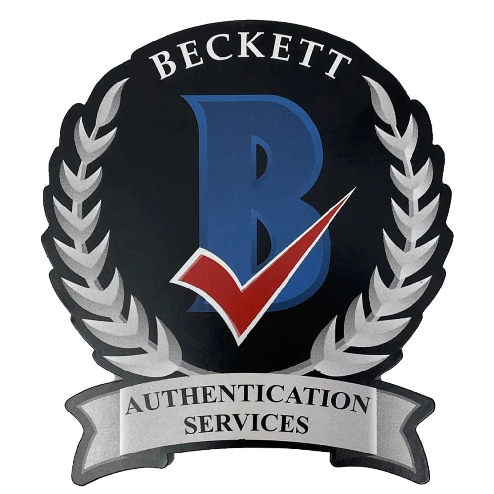 Black and silver emblem with blue B and red checkmark on Trae Young Fanatics Jersey