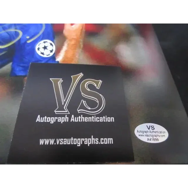 Authentic autograph authentication label on Xavi Barcelona signed 8x10 photo