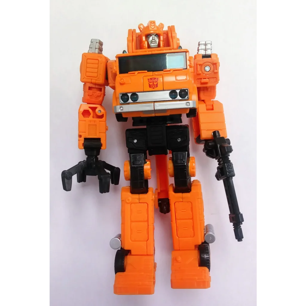 Autobot Grapple Transformers action figure in orange black vehicle mode