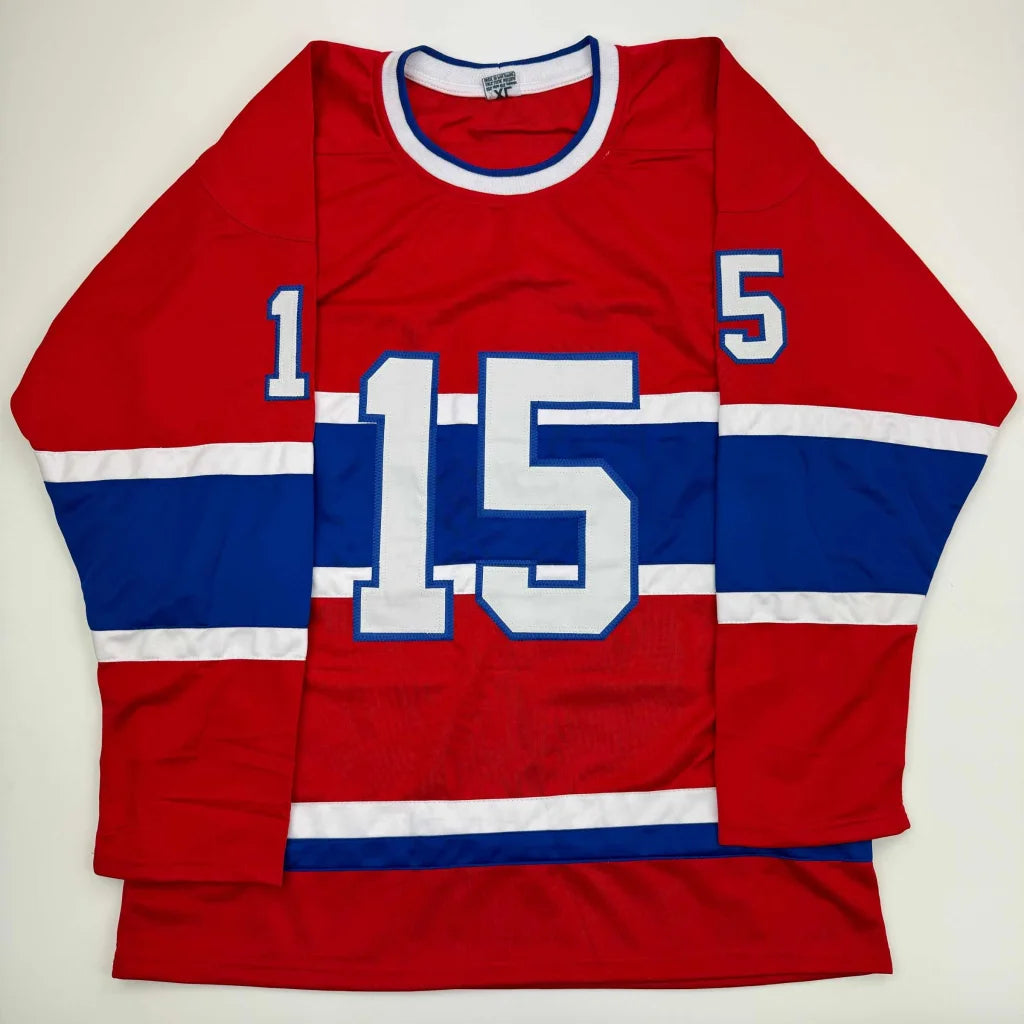Red, white, blue long-sleeved custom jersey with number 15 from a pro sports league