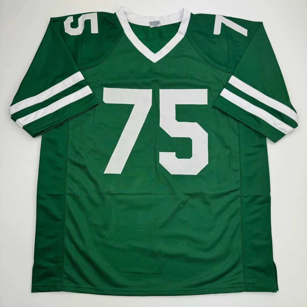 Green and white custom jersey with number 75 from Vera Tucker for professional sports fans