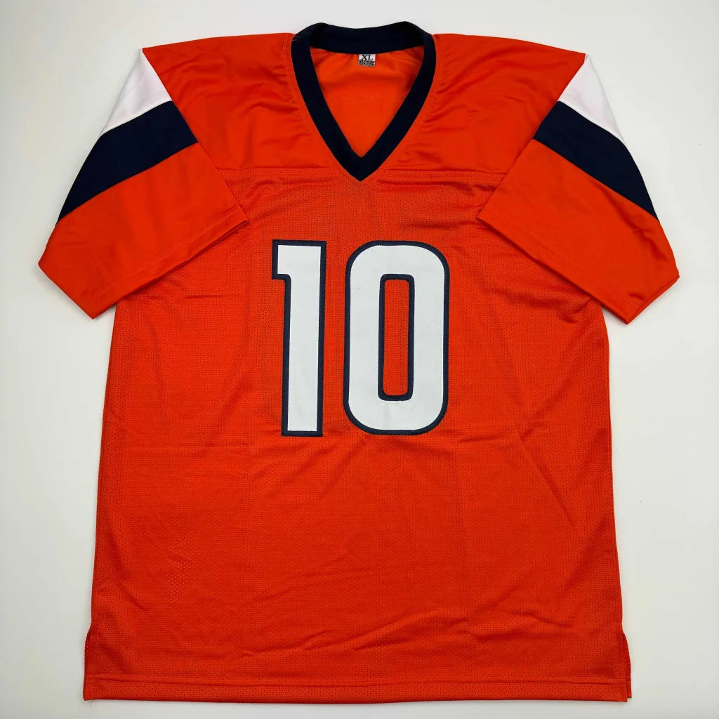 Orange football jersey with number 10 from NIX custom jersey signed by a pro sports athlete