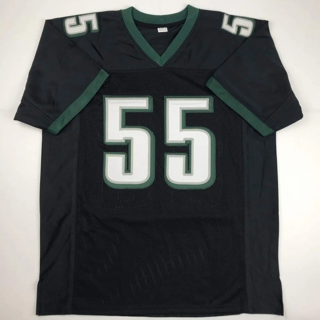 Black and green custom football jersey with number 55 from professional sports league