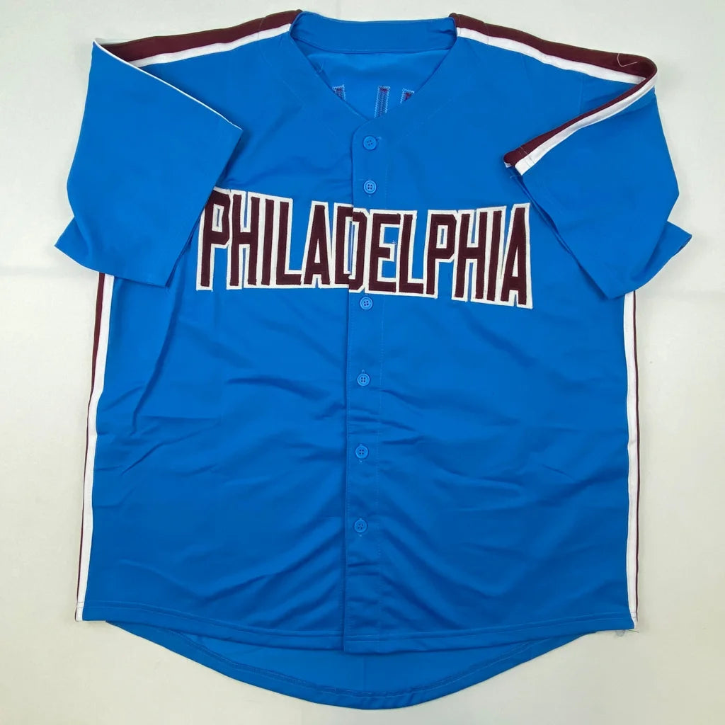 Blue custom jersey from professional sports league with PHILADELPHIA lettering