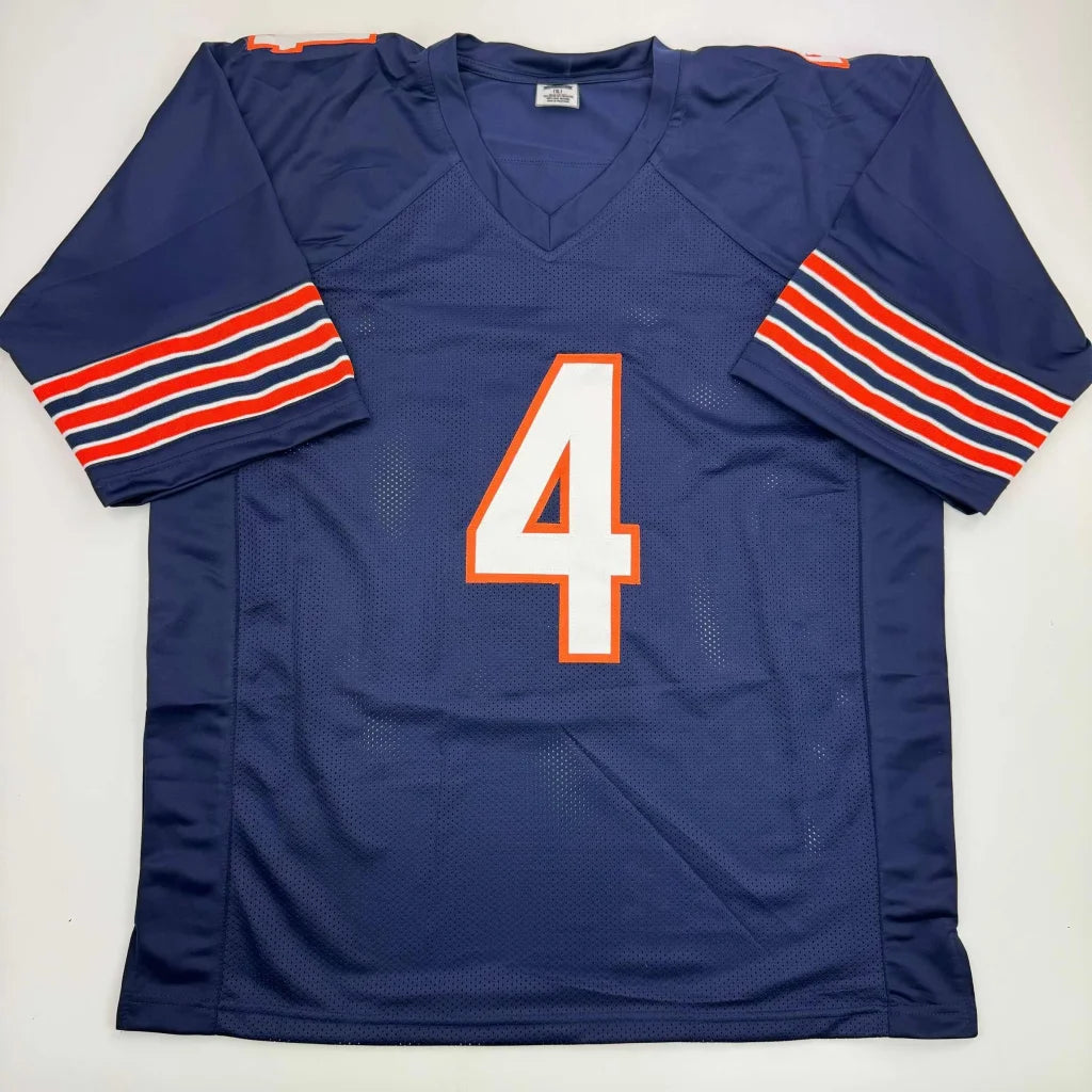 Navy blue custom jersey with orange and white stripes and number 4 for professional sports league